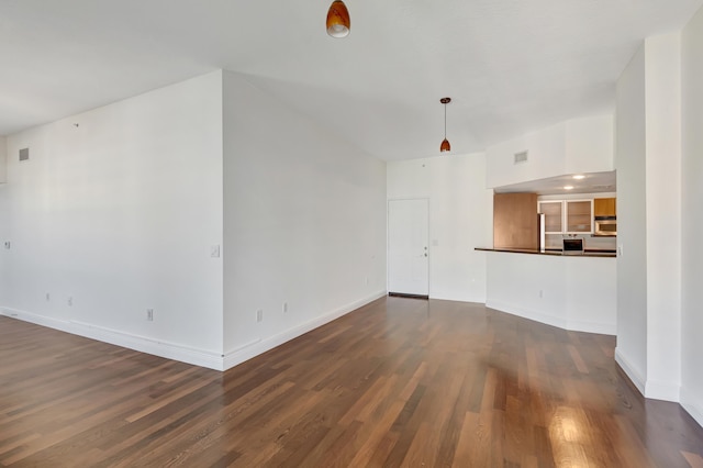 unfurnished living room with dark hardwood / wood-style floors