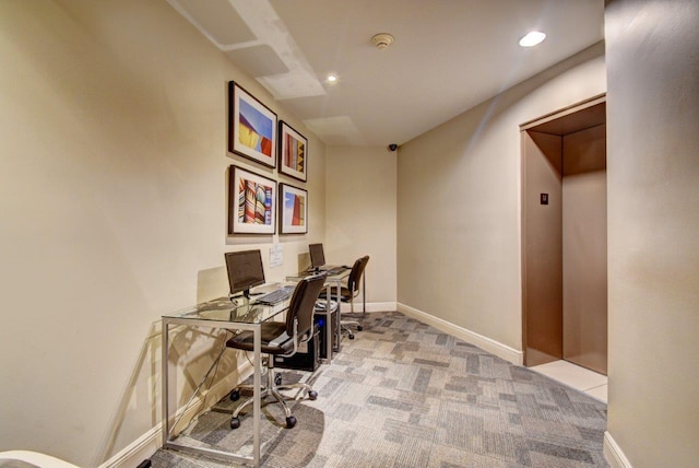 office area featuring light colored carpet