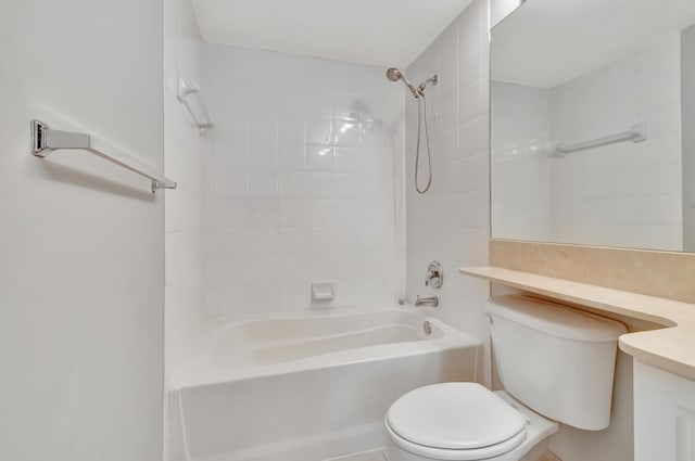 full bathroom featuring vanity, toilet, and tiled shower / bath combo