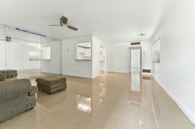 living room with ceiling fan