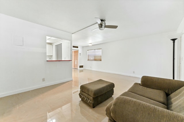 living room featuring ceiling fan