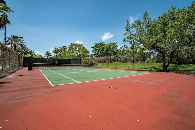 view of sport court with basketball hoop