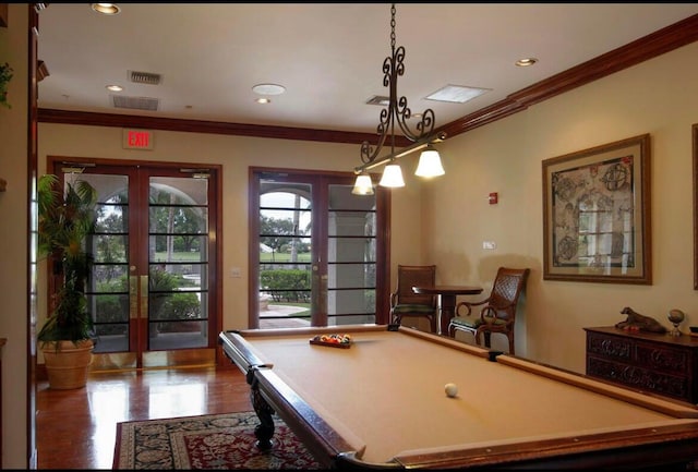 rec room featuring dark wood-type flooring, crown molding, billiards, and french doors