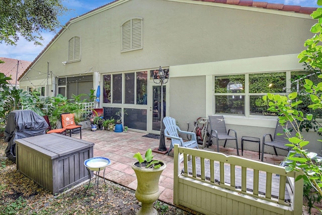 rear view of house featuring a patio area