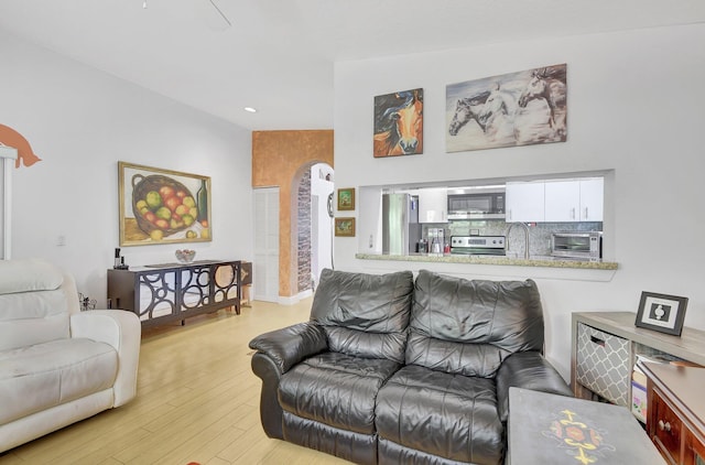 living room with light hardwood / wood-style flooring