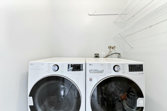 laundry area featuring separate washer and dryer