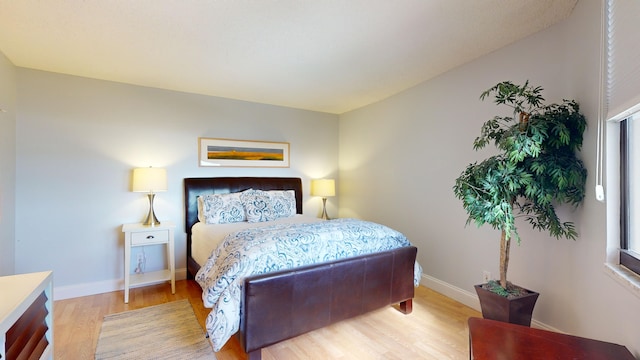 bedroom featuring light hardwood / wood-style flooring