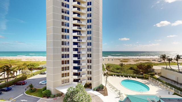 view of water feature with a beach view