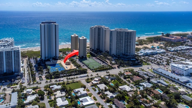 aerial view featuring a water view and a beach view