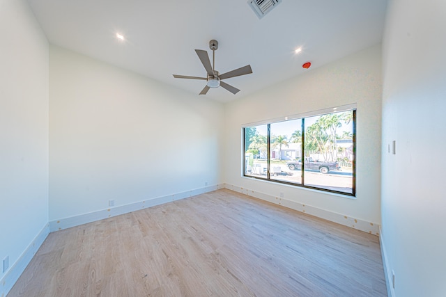 unfurnished room featuring ceiling fan and light hardwood / wood-style floors