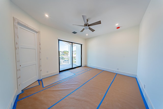 spare room with ceiling fan