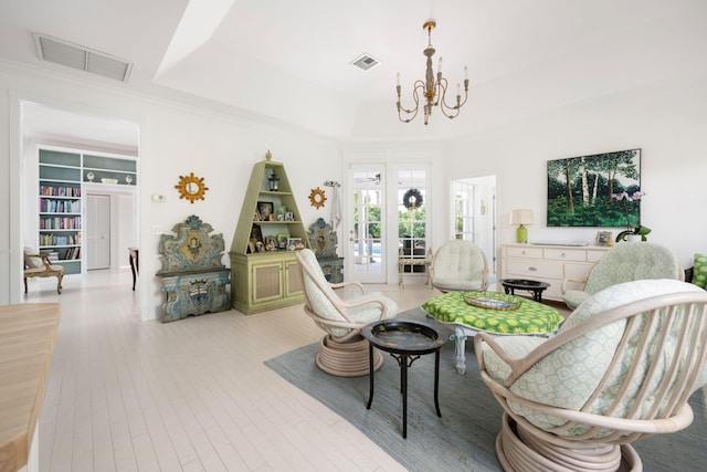 3645 Ocean Dr, Vero Beach, FL 32963 - living room with a chandelier and wood finished floors