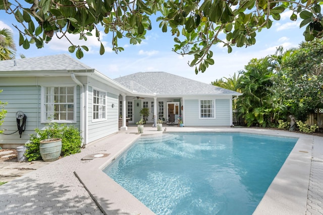 3645 Ocean Dr, Vero Beach, FL 32963 - view of swimming pool featuring ceiling fan and a patio