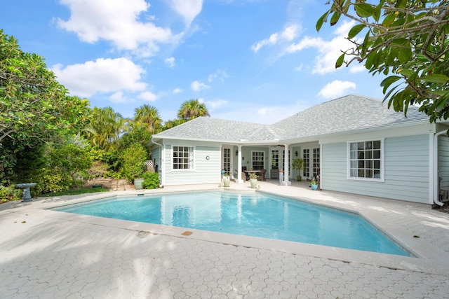 view of swimming pool with a patio