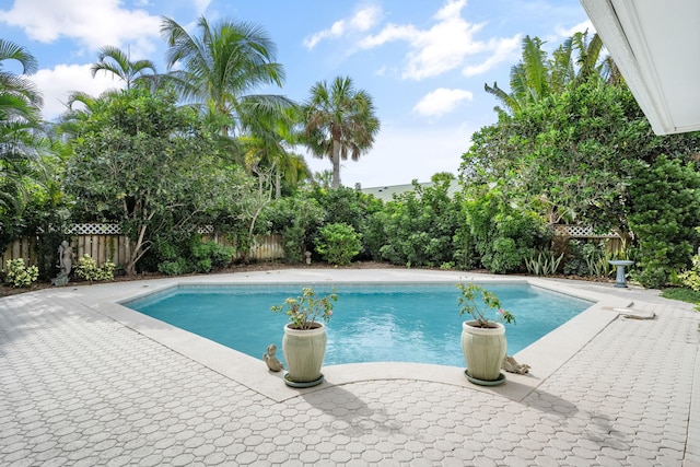 3645 Ocean Dr, Vero Beach, FL 32963 - view of pool featuring a fenced backyard and a patio area