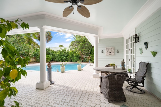 view of pool featuring ceiling fan and a patio area