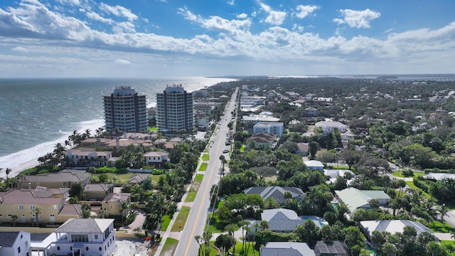 aerial view with a water view and a view of the beach