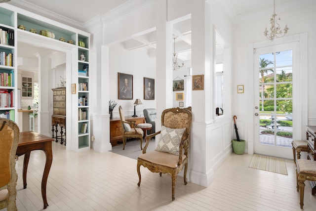 3645 Ocean Dr, Vero Beach, FL 32963 - living area featuring hardwood / wood-style floors, a chandelier, crown molding, a decorative wall, and beam ceiling
