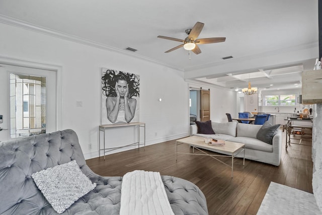 living room featuring ceiling fan with notable chandelier, ornamental molding, and dark wood-type flooring