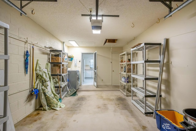 storage room featuring washing machine and clothes dryer