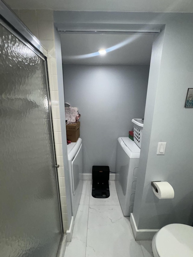 washroom featuring separate washer and dryer