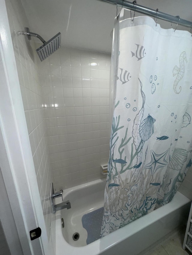 bathroom featuring shower / bath combination with curtain