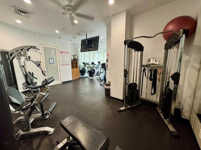 workout area with ceiling fan