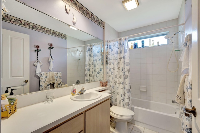 full bathroom featuring toilet, tile patterned flooring, vanity, and shower / tub combo with curtain