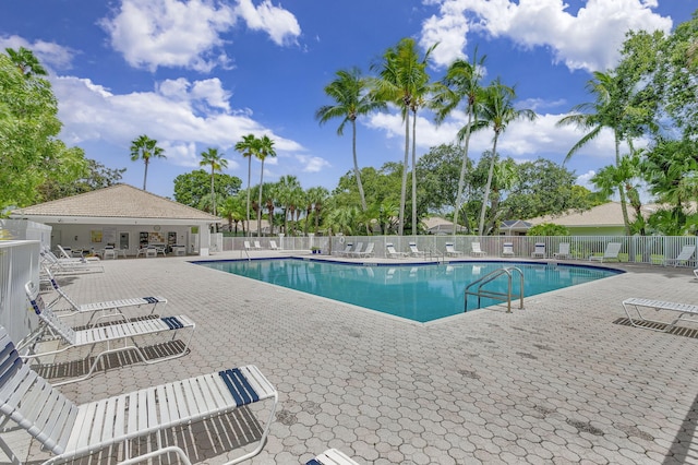 view of pool featuring a patio