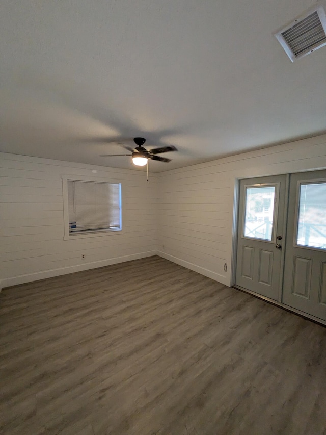 entryway featuring french doors, dark hardwood / wood-style floors, and ceiling fan