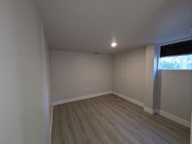 unfurnished room featuring light hardwood / wood-style floors