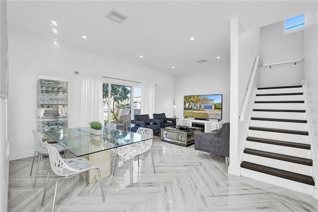 dining area with light parquet flooring