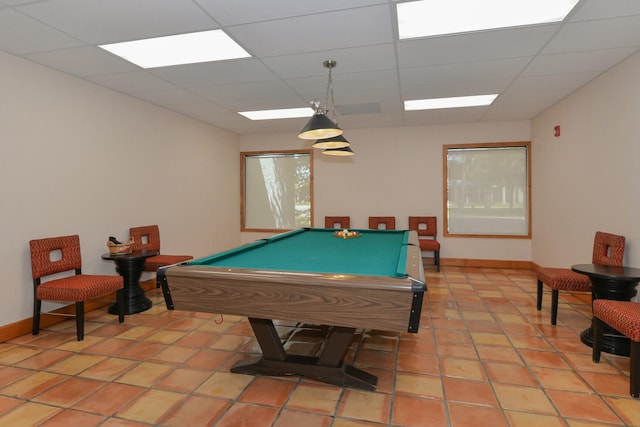 game room with a drop ceiling, light tile patterned floors, and pool table