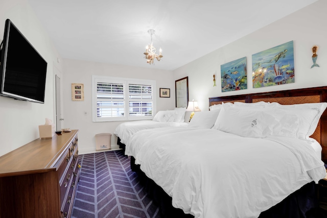 bedroom featuring a chandelier