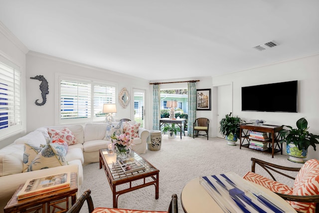 living room with carpet floors and ornamental molding