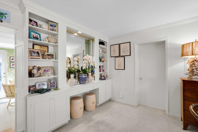 living area featuring crown molding and light tile patterned flooring