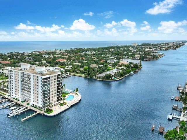 birds eye view of property featuring a water view