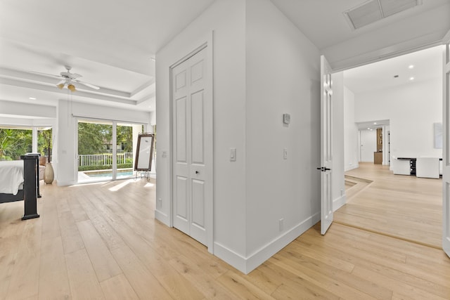 corridor featuring light wood-type flooring