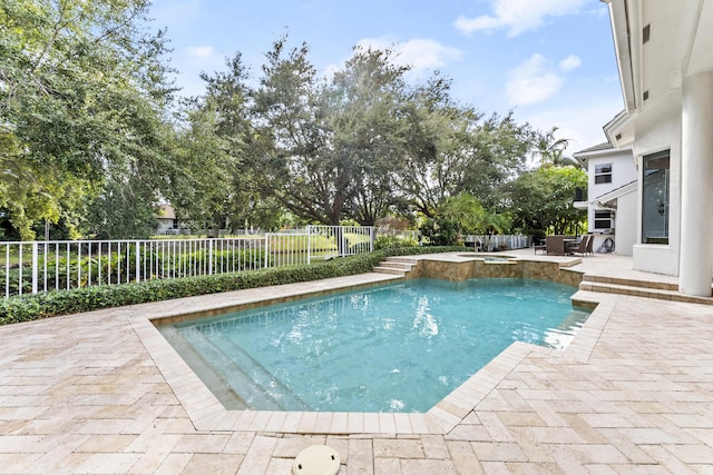 view of swimming pool featuring a patio area