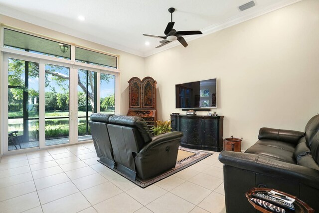 tiled living room featuring ornamental molding, a textured ceiling, and indoor bar