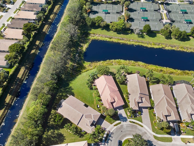 bird's eye view featuring a water view and a residential view