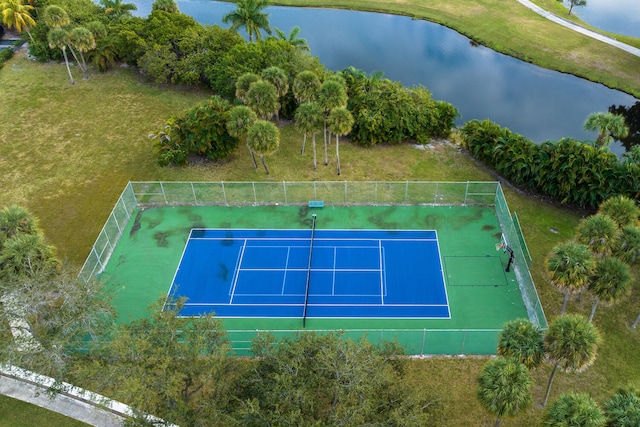 view of sport court featuring a water view