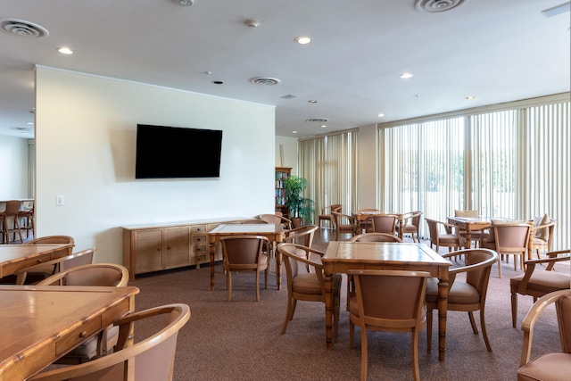 view of carpeted dining space