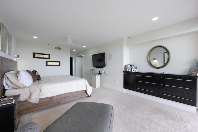 bedroom with light carpet and ceiling fan