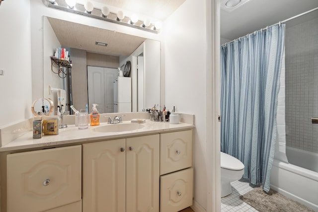 full bathroom featuring tile patterned floors, vanity, shower / tub combo, and toilet