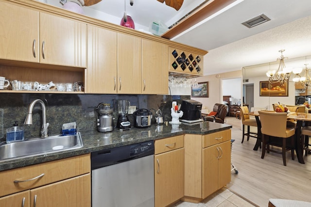 kitchen with sink, light hardwood / wood-style flooring, stainless steel dishwasher, decorative backsplash, and light brown cabinetry