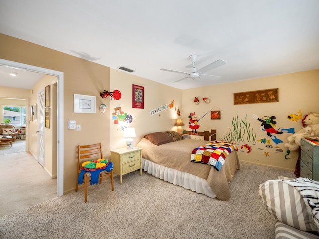 carpeted bedroom featuring ceiling fan