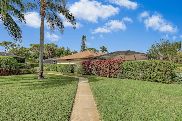 view of yard featuring a lanai