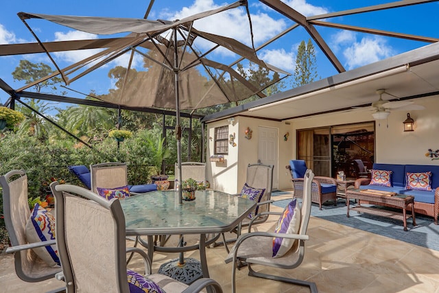 view of patio featuring ceiling fan, a lanai, and an outdoor hangout area