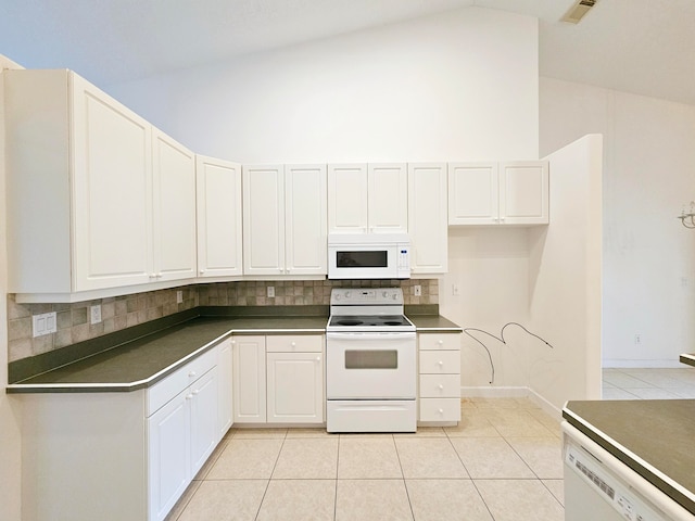 kitchen with decorative backsplash, white appliances, light tile patterned floors, high vaulted ceiling, and white cabinets